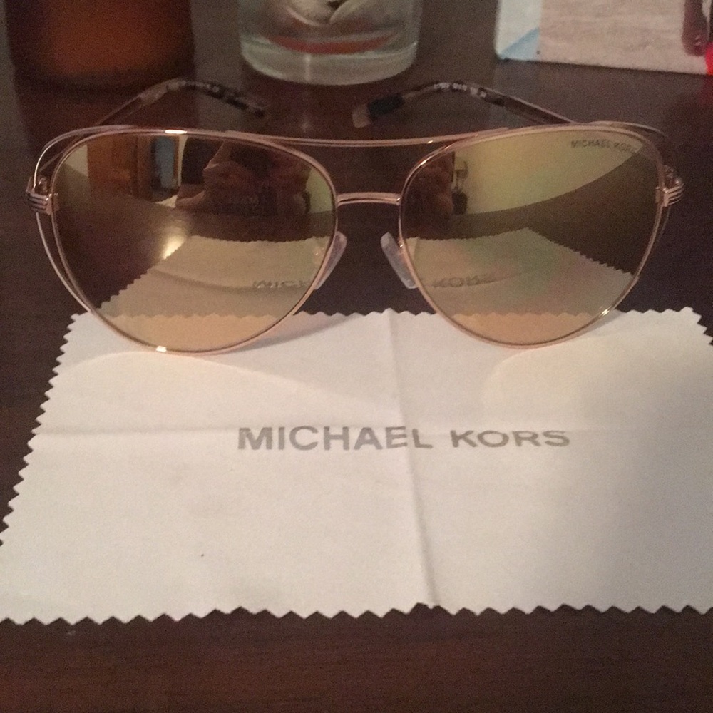 Pair of women’s Michael Kors sunglasses.